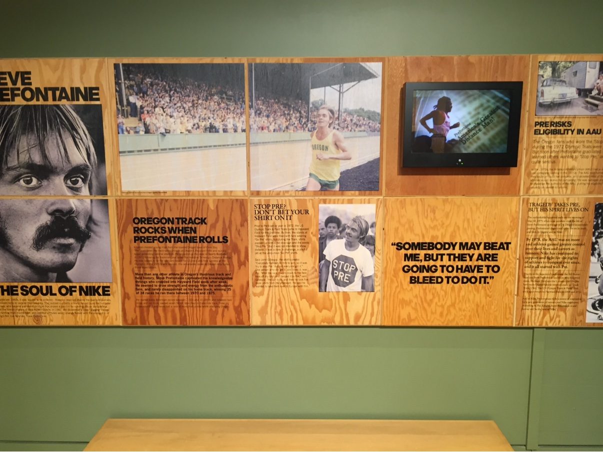 The Prefontaine exhibit wall at Nike Headquarters — panels headed 'Steve Prefontaine — The Soul of Nike', race photos and the 'Somebody may beat me' quote