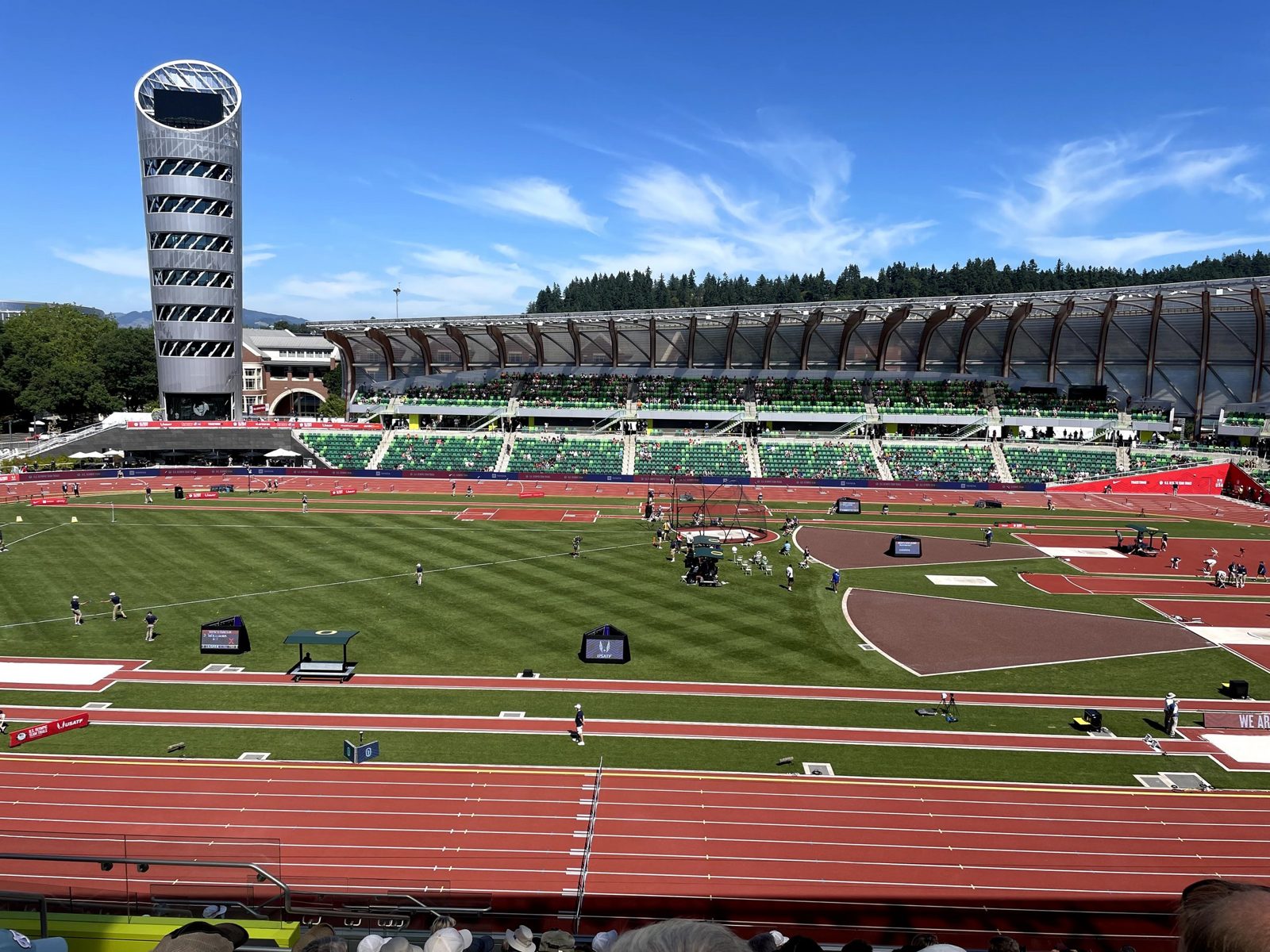 The rebuilt Hayward Field during the 2021 U.S. Olympic Trials — Bowerman Tower rising over the green seats and red nine-lane track